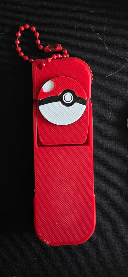 Phone stand and key-chain with fidget