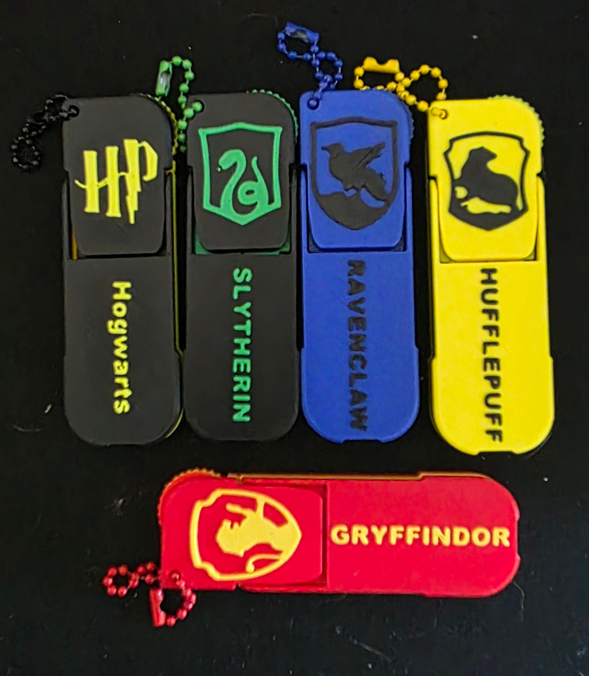 Phone stand and key-chain with fidget